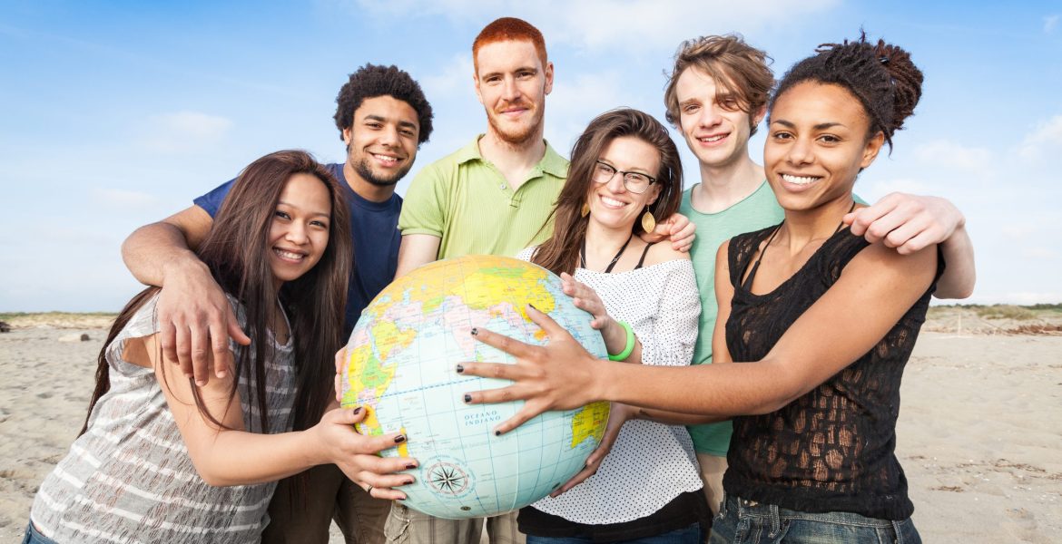 Multiracial Group of Friends with World Globe Map